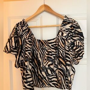 Queen of sparkles tiger print flutter sleeve top